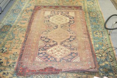 A Hamadan rug with triple-pole