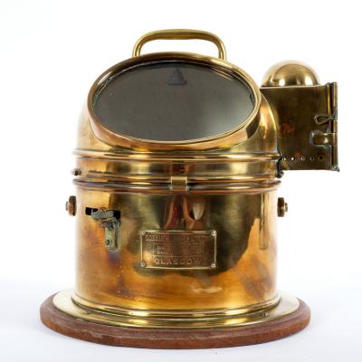 A brass cased ship's binnacle containing