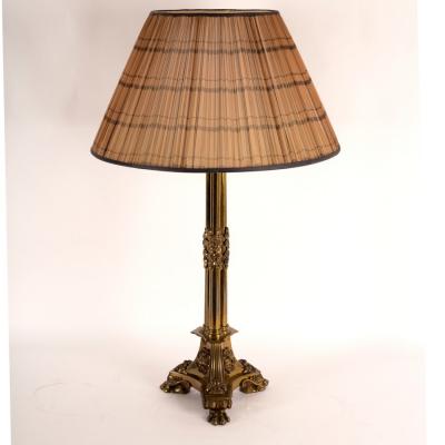 A gilt brass table lamp of column