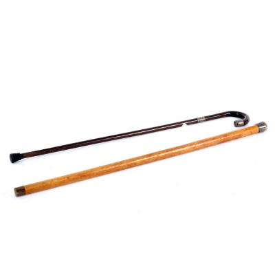 A malacca walking cane with plain