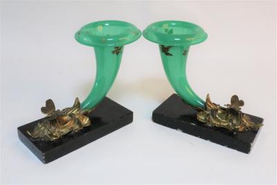 A pair of green glass cornucopia