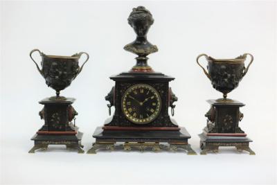 A Victorian black marble clock