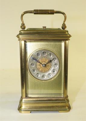 A gilt brass carriage clock, the