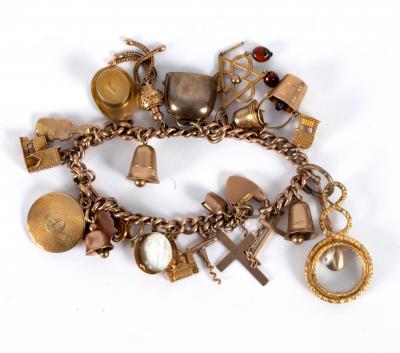 A 9ct rose gold charm bracelet with