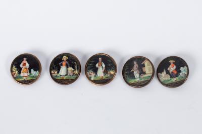 Five hand painted buttons depicting