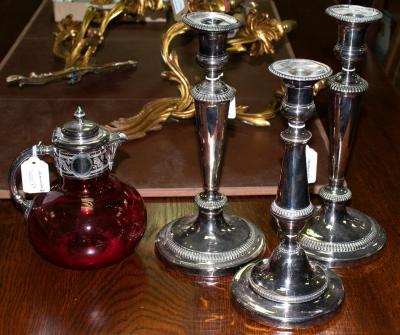 Three plated candlesticks and a