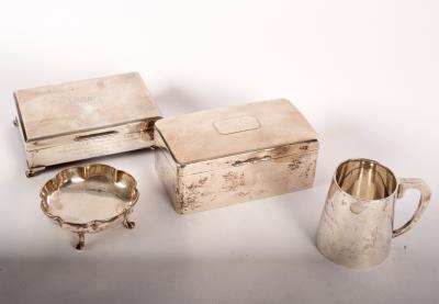 Two silver cigarette boxes, a four-footed