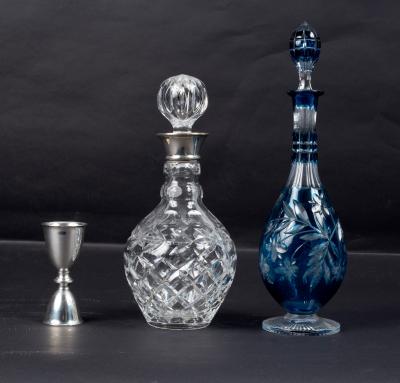 A silver mounted cut glass decanter,