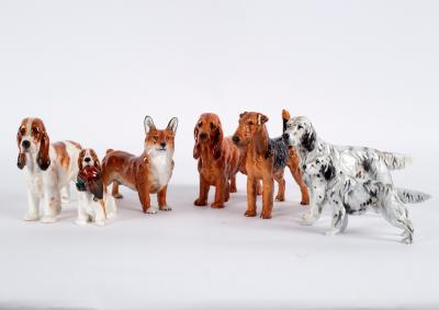 Seven Royal Doulton figures of dogs,