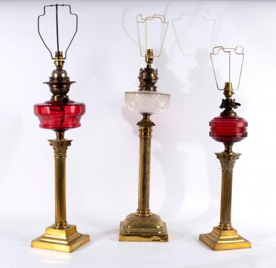 Three oil lamps, converted for electricity,