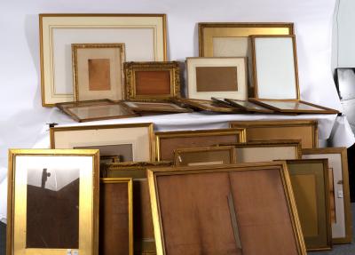 A quantity of picture frames, some with