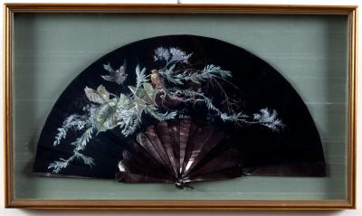 An embroidered floral fan with