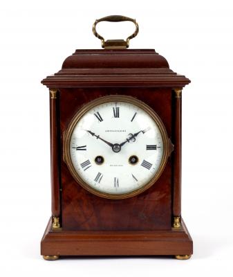 A mahogany arched mantel clock  2ddf26