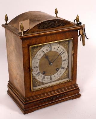 A German walnut cased mantel clock,