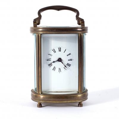 A miniature eight-day carriage clock,