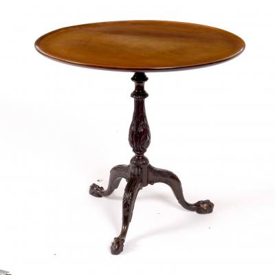 A mahogany table of 18th Century design,