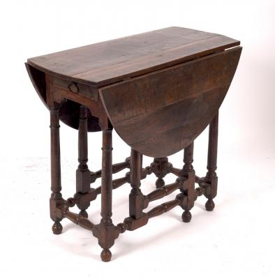 An oak two-flap oval gateleg table,