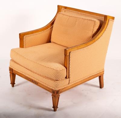 A satinwood framed armchair with upholstered