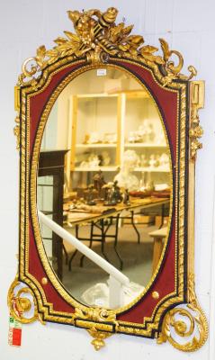 An Empire style gilt framed mirror