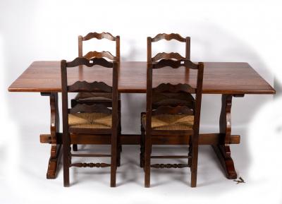 A reproduction refectory table and four