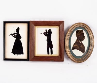 A 19th Century silhouette of a violinist,