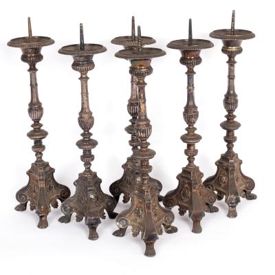 A set of six plated altar candlesticks,