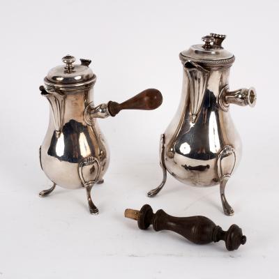 A near pair of French silver coffee
