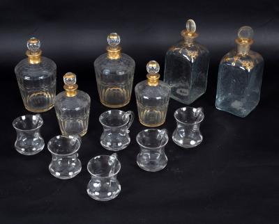 A set of four decanters and stoppers