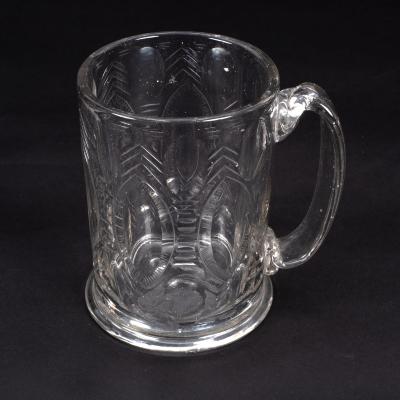 A Bohemian flat-cut glass mug,