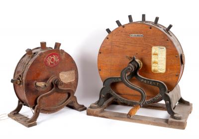 Two Edwardian knife sharpeners,