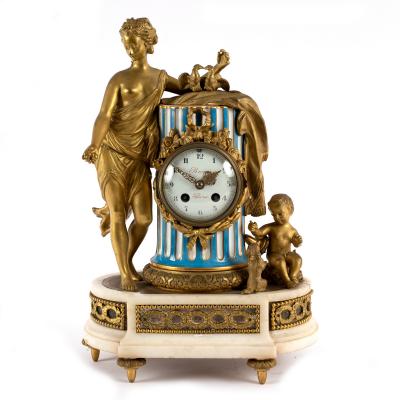 A French gilt metal mounted mantel clock,