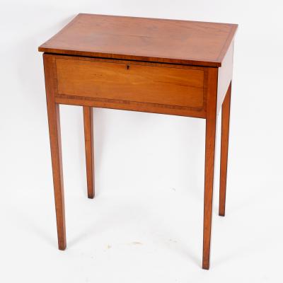 A George III satinwood worktable,