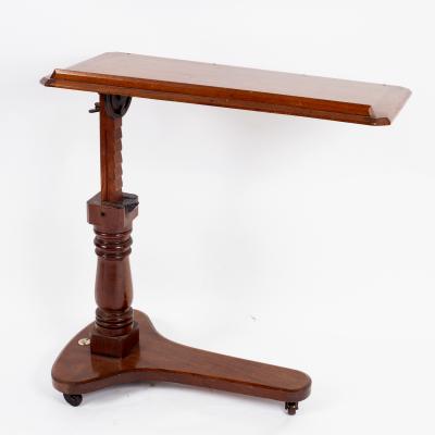 A William IV mahogany bed table,