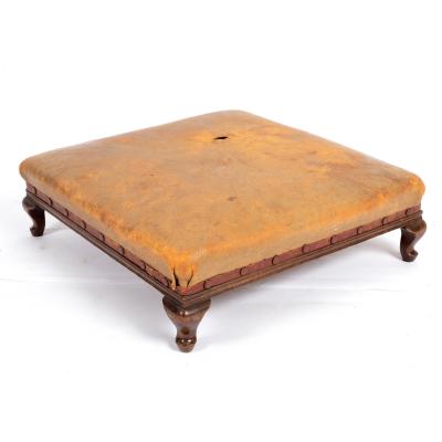 A beechwood footstool with a square 2de327