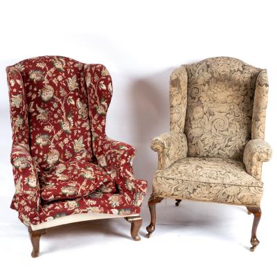 A walnut wing armchair, in Queen