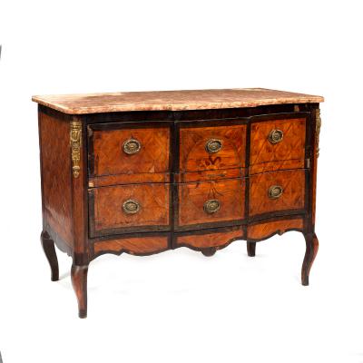 A Louis XVI marble topped commode, circa