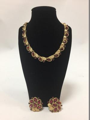 Trifari, a necklace and matching earrings,