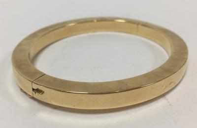 A Continental gold bangle of flattened 2de354