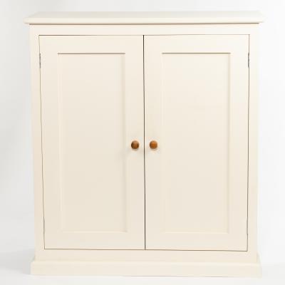 A white painted cupboard enclosed by