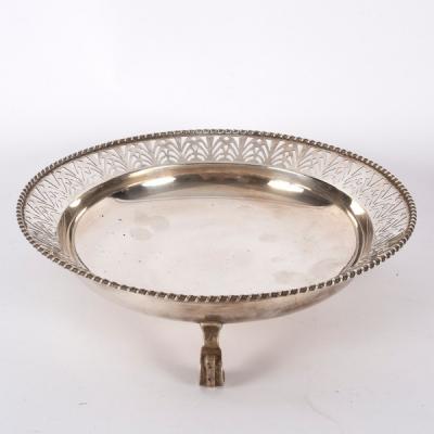A shallow circular silver bowl,