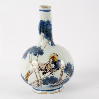 A Delft polychrome vase with tapered