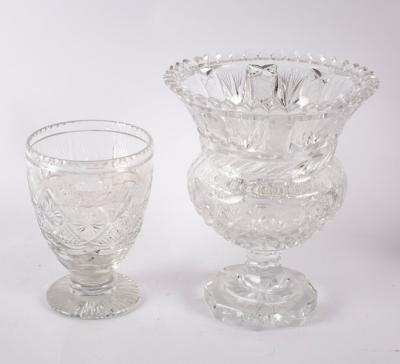 A heavy cut glass thistle-shaped vase