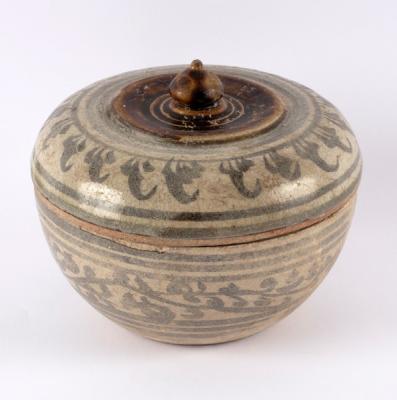 A Persian pottery bowl and cover