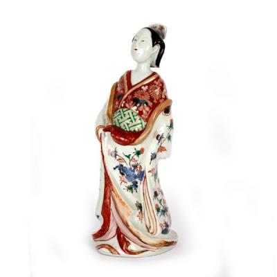 A Japanese Arita figure of a Bijin,