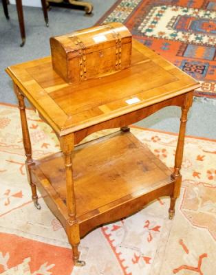 A yew wood two-tier table and a tea