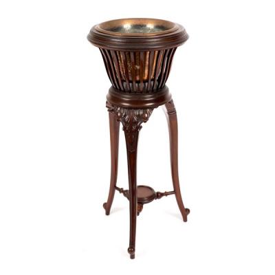 An Edwardian mahogany slatted jardinière