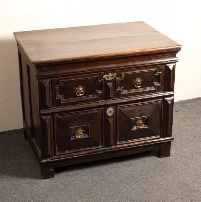 A Charles II oak two drawer chest  2de7cb