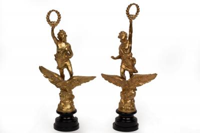A pair of gilt metal Classical figures,