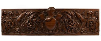 A carved walnut Renaissance style