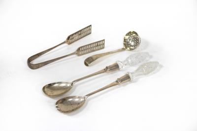 A pair of silver salad servers with